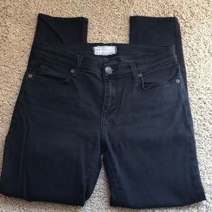 Free People black denim jeans.